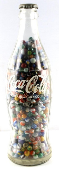 19" MEXICAN COCA COLA  BOTTLE FULL ANTIQUE MARBLES