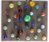 LOT OF 29 VINTAGE GLASS MARBLES CAT EYE