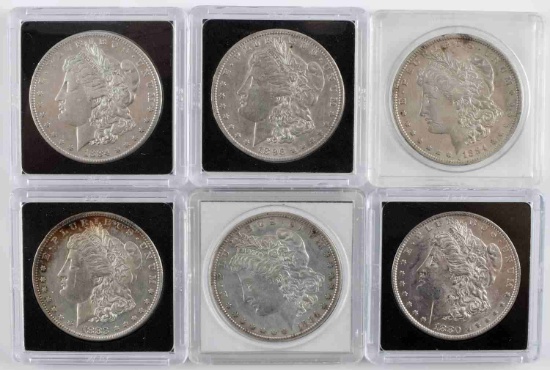 LOT OF 7 UNCIRCLUATED MORGAN SILVER DOLLARS