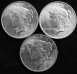 3 US PEACE SILVER DOLLARS MINT STATE COINS