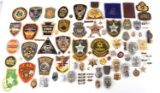 LARGE LOT OF OBSOLETE POLICE AND SHERIFF BADGES