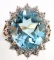 14KT GOLD RING W 12 CARAT BLUE TOPAZ