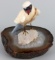 CARVED GEMSTONE BIRD SCULPTURE WITH GEODE STAND