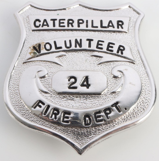 CATERPILLAR VOLUNTEER FIRE DEPARTMENT 24 BADGE