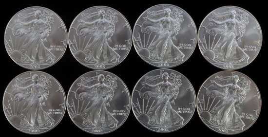 LOT 8 AMERICAN EAGLE 1 OZ SILVER DOLLAR COINS
