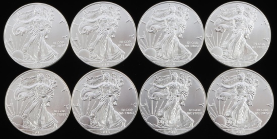 LOT OF 8 AMERICAN EAGLE SILVER 1 OZ COINS