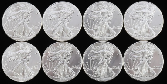 LOT OF 8 AMERICAN EAGLE SILVER 1 OZ COINS