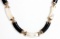 10KT YELLOW GOLD NECKLACE WITH ONYX & MOTHER PEARL