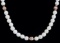 18 INCH ANTIQUE IVORY AND 14K GOLD BEAD NECKLACE