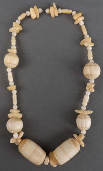 STRING OF LARGE BEADS MADE FROM ANTIQUE IVORY