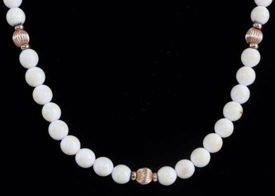18 INCH ANTIQUE IVORY AND 14K GOLD BEAD NECKLACE