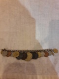 Foreign coin charm bracelet..6 1/2in lonh
