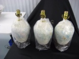 Three porcelain lamps items 301 302 303