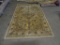 Oriental rug-5.6' x 8.3'-has some faded spots