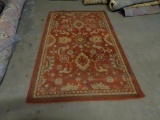 Oriental Rug-made in India, 70% cotton, 25% rayon, 5% Polyester. 4.8' x 7.6'. small tear on corner.