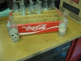 Coca Cola Crate with 75th anniversary bottles.