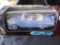 4 Die Cast Cars: '57 Chevy Bel Air (blue), '57 Chevy Bel Air (red), '57 Chevy Nomad, '57 Chevy Nomad
