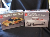 4 Model Kits: Kodak film OLDS (2), '55 Cameo Pickup and Kodak film Chevrolet