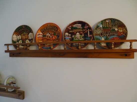 Plates and flowers on wall, plus plate holder.