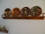 Plates and flowers on wall, plus plate holder.