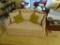 Loveseat w/ quilted fabric plus pillows. 52