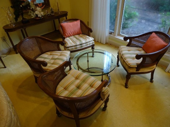 4 chairs (by Kindel) on rollers w/cane back plus 25" round glass/metal table, 16" H.