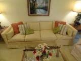 Upholstered sofa w/ pillows-100