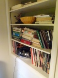 Everything on shelves-cookbooks, RCA electronics, etc.
