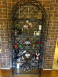Everything on shelves-decanters, bowls, flowers, candle, etc