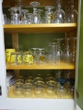 3 shelves of glassware-wine, cocktail and high ball