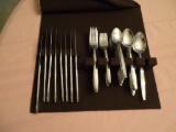 Set of Stainless flatware-8 piece plus extra spoons and misc pieces