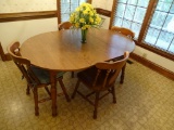 Oval kitchen table w/4 chairs. 60