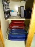 2 shelves of casserole dishes and bakeware.