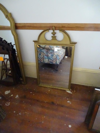 Mirror with gold frame-top centerpiece needs to be glued back on.