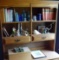 Items on shelves on top of bookcase. Walkie Talkies, Ansel Adams 
