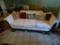 Vintage claw foot sofa with pillows