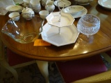 3 items on table: large bowl, tiered dessert tray, bowl