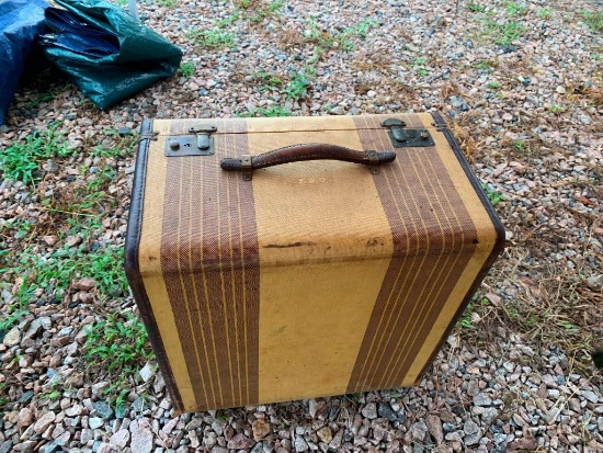 Vintage suitcase, spacious with slots along the sides for storing cosmetics