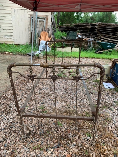 Antique iron bed, assumed twin size, see measurements. Brass accents and nice details