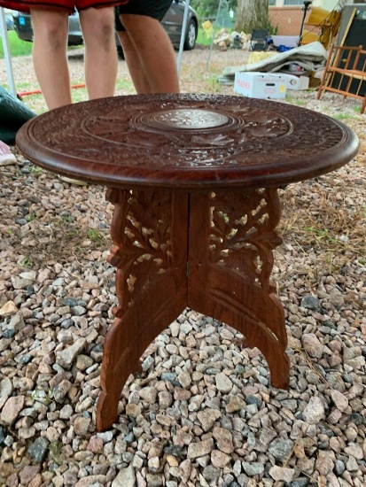 Wooden Asian-inspired occasional table with inlay. Top and legs are two separate pieces.