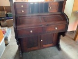 Antique beautifully crafted pump organ cleverly modified to a desk.
