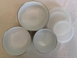 Three matching ceramic-over-metal bowls