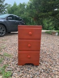 Small wooden three-drawer chest / night stand - red