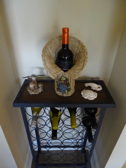 Wine rack , wine basket, plus salt/pepper shakers and seagull statue. Rack is 34"T x 20"W x 9"D
