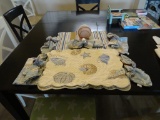 6 reversible place mats and napkins plus 5 napkin rings and napkin holder