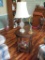 Round side table and items on table. Table: 27