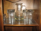 Glassware-includes several pitchers and 22 glasses etched with an 