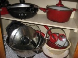 Colanders, frying pans, chicken roaster, 2 sauce pans, 2 Dutch ovens