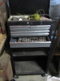 Toolbox on wheels and the tools inside