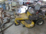Hustler Raptor Zero turn lawn mower with grader in the front